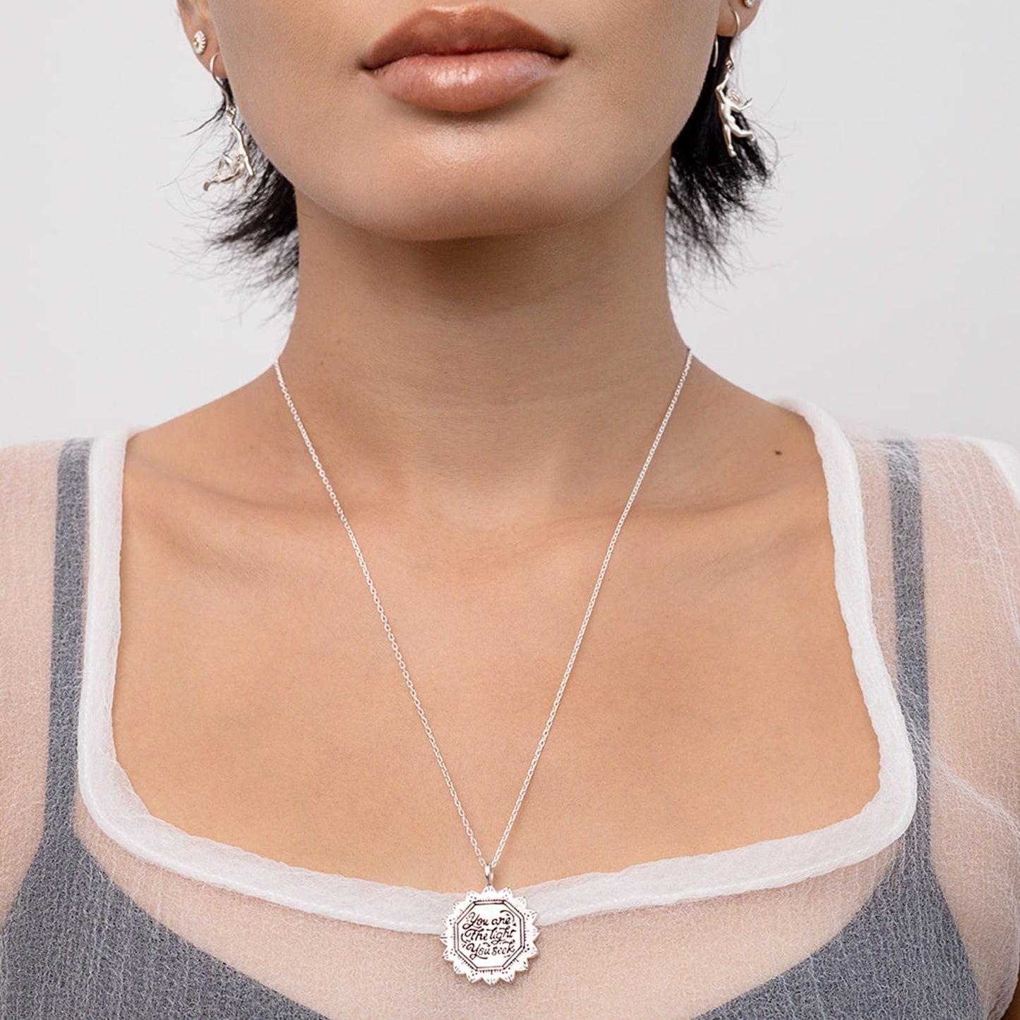 Sunflower Pendant with You Are the Light You Seek text - Hunt Of Hounds